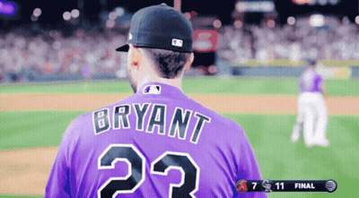 A Baseball Player Wearing A Purple Jersey With Bryant On It GIF