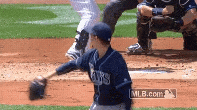 A Baseball Player Wearing A Rays Jersey Is About To Throw The Ball GIF
