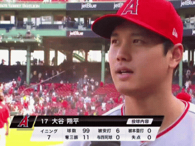 A Baseball Player Wearing A Red A Hat Stands In Front Of A Jetblue Banner GIF