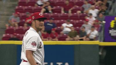 A Baseball Player Wearing A Red Hat With A C On It GIF