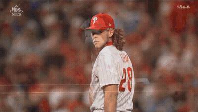 A Baseball Player Wearing A Red Hat With A P On It GIF