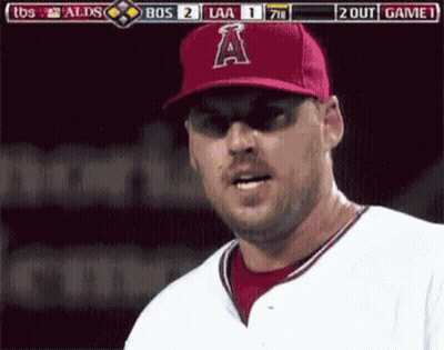 A Baseball Player Wearing A Red Hat With The Letter A On The Front GIF