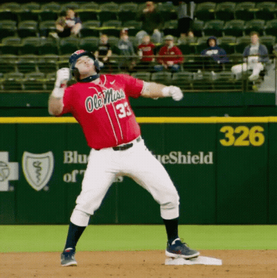 A Baseball Player Wearing A Red Jersey That Says Ole Miss On It GIF