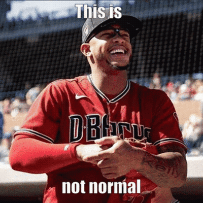 A Baseball Player Wearing A Red Jersey That Says " This Is Not Normal " On It GIF