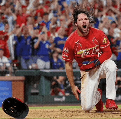 A Baseball Player Wearing A Red Jersey With The Word The Lou On It GIF