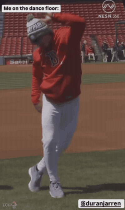 A Baseball Player Wearing A Red Sox Hoodie Is Dancing On The Dance Floor GIF