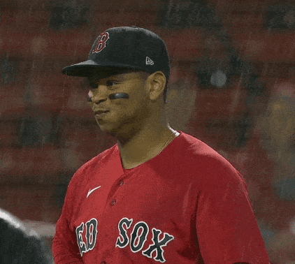 A Baseball Player Wearing A Red Sox Jersey GIF