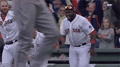 A Baseball Player Wearing A Red Sox Jersey Is Dancing GIF