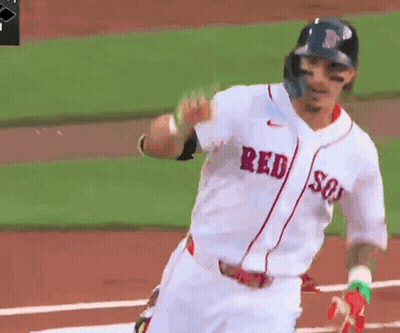 A Baseball Player Wearing A Red Sox Jersey Is Running Towards Home Plate GIF