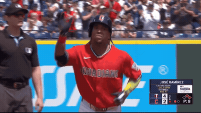 A Baseball Player Wearing A Red Uniform That Says Guardians On It GIF