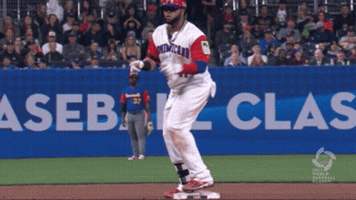A Baseball Player Wearing A Red White And Blue Uniform With The Word Dominican On It GIF