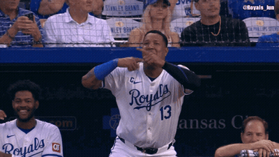 A Baseball Player Wearing A Royals Jersey Is Making A Funny Face GIF