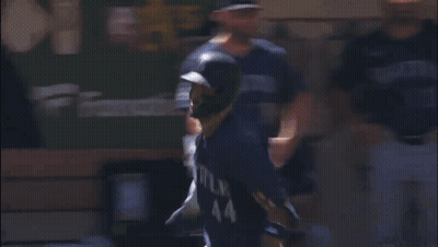 A Baseball Player Wearing A Seattle Jersey Runs On The Field GIF
