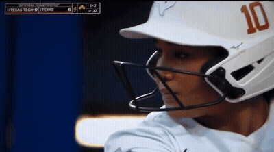 A Baseball Player Wearing A White Helmet With The Number 10 On It GIF