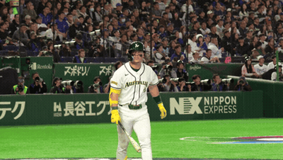 A Baseball Player Wearing A White Jersey With Australia On It GIF