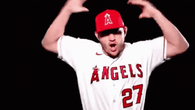 A Baseball Player Wearing A White Jersey With The Number 27 On It GIF