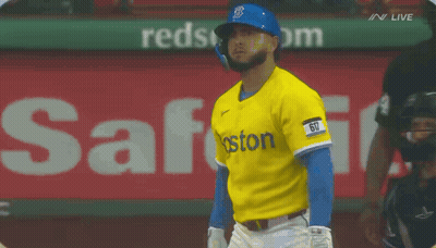 A Baseball Player Wearing A Yellow And Blue Boston Jersey GIF