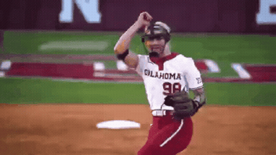 A Baseball Player Wearing An Oklahoma Jersey Is Standing On The Field GIF