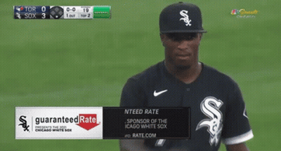 A Baseball Player With A Guaranteed Rate Advertisement On His Shirt GIF