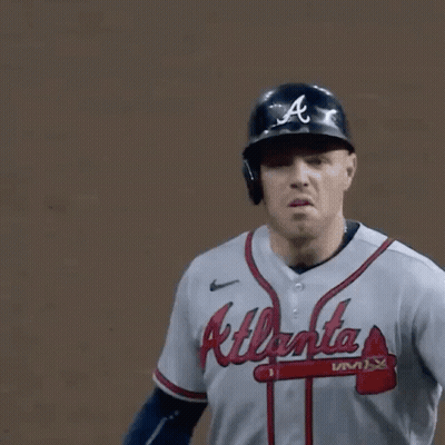 A Baseball Player With A Jersey That Says Atlanta Braves On It GIF