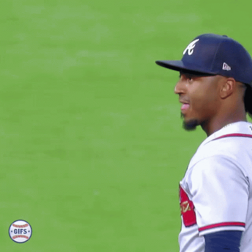 A Baseball Player With A Ponytail On His Head GIF