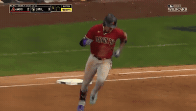 A Baseball Player With Ari On His Jersey Is Running On The Base GIF