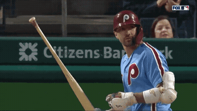 A Baseball Player With The Letter P On His Helmet Holds His Bat GIF