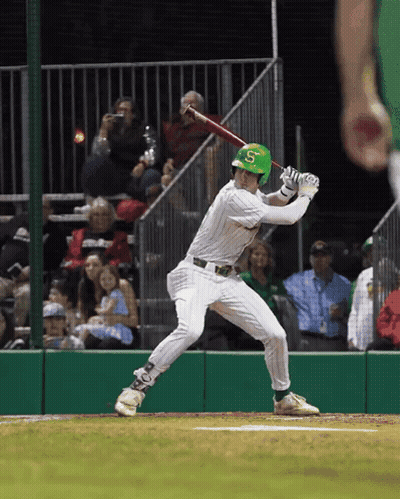 A Baseball Player With The Letter S On His Helmet Swings At A Pitch GIF