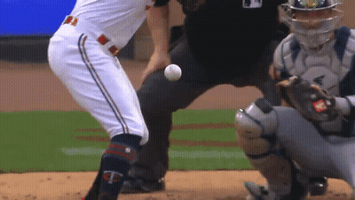 A Baseball Player With The Letter T On His Knee Is About To Throw The Ball GIF