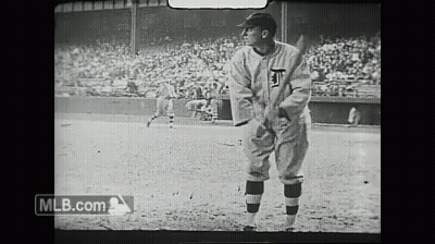 A Baseball Player With The Letter T On His Shirt GIF