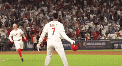 A Baseball Player With The Name Adelz On The Back Of His Jersey GIF