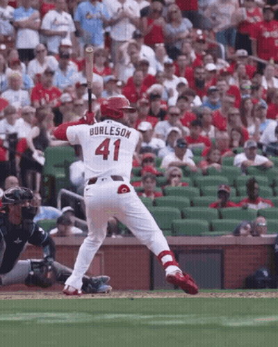 A Baseball Player With The Name Burleson On His Back GIF