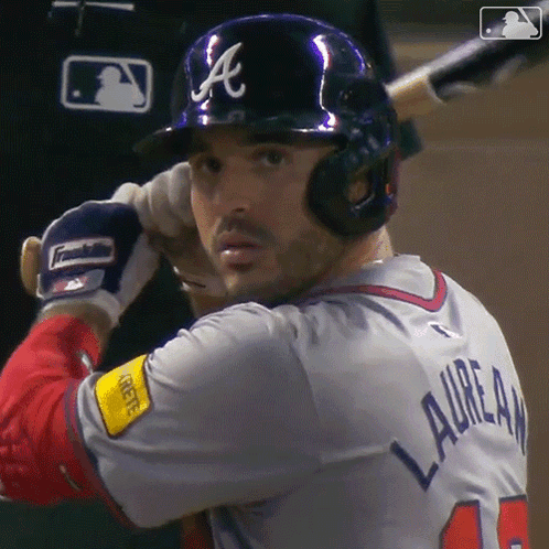 A Baseball Player With The Name Laura On His Back GIF