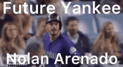 A Baseball Player With The Name Nolan Arenado On His Jersey GIF