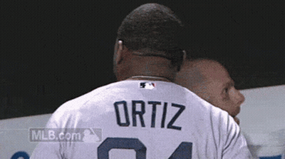 A Baseball Player With The Name Ortiz On His Shirt GIF