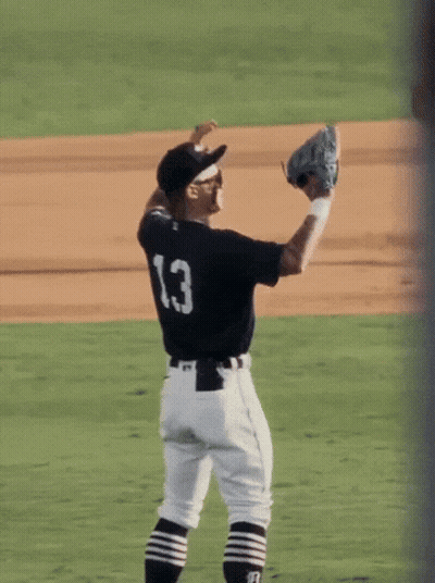 A Baseball Player With The Number 1.3 On His Back GIF
