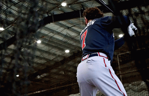 A Baseball Player With The Number 1 On The Back Of His Shirt GIF