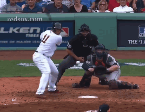 A Baseball Player With The Number 11 On His Back GIF