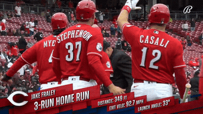 A Baseball Player With The Number 12 On The Back Of His Shirt GIF