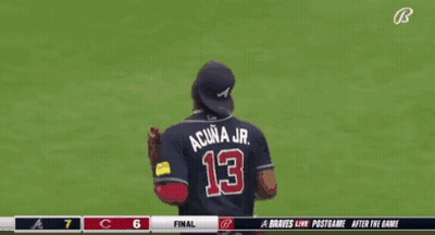 A Baseball Player With The Number 13 On His Back Is Running On The Field GIF