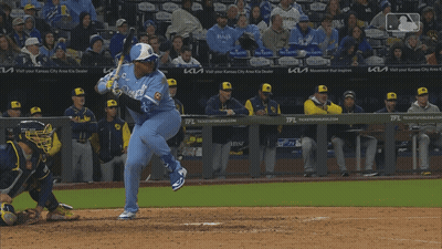 A Baseball Player With The Number 13 On His Jersey Swings At A Ball GIF