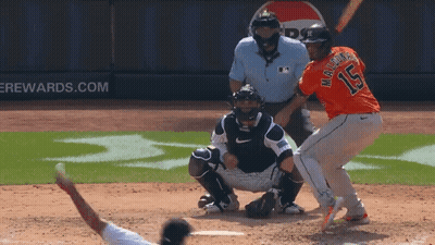 A Baseball Player With The Number 15 On His Jersey Is At Bat GIF