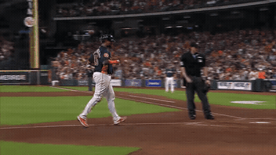 A Baseball Player With The Number 15 On His Jersey Is Walking On The Field GIF