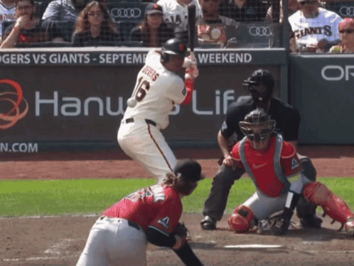 A Baseball Player With The Number 16 On His Jersey Swings At A Ball GIF