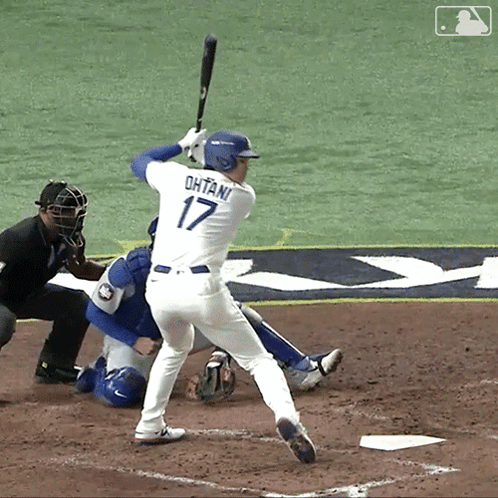 A Baseball Player With The Number 17 On His Jersey GIF