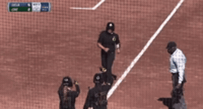 A Baseball Player With The Number 2 On His Back Is Talking To A Referee On The Field GIF
