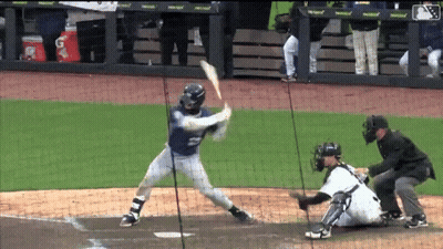 A Baseball Player With The Number 2 On His Jersey Is Swinging At A Pitch GIF