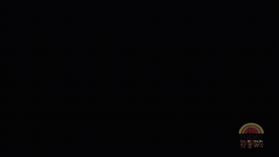 A Baseball Player With The Number 2 On His Jersey Stands In A Stadium GIF