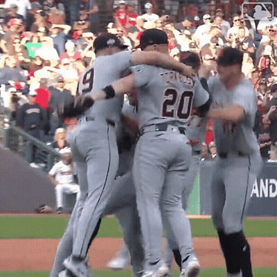 A Baseball Player With The Number 20 On His Back Is Hugging Another Player GIF