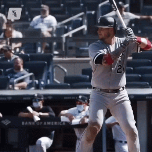A Baseball Player With The Number 21 On His Jersey Is About To Swing His Bat GIF